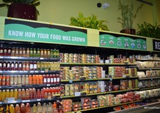 Juices and pre-cut fruit and vegetables. This is where the Responsibly Grown signage starts.
