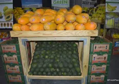 Papayas and avocados on display in the OK Produce booth.