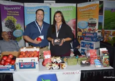 Jeff Simonian and Kristin Lopez with Simonian Fruit Company. The company has a large selection of Central Valley-grown fruit on display in the booth.