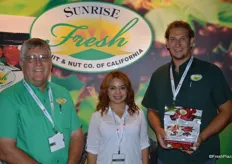 Jim Samuel, Jessica Becerril and Jake Samuel from Sunrise Fresh proudly showing a new product: dried cherries.