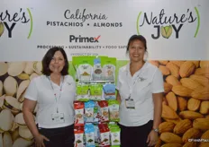 Deborah Loyd and Leilani Talty with Nature's Joy, showing different (flavored) pistachio and almond products.