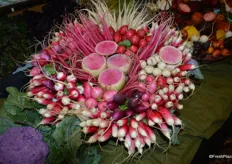 Display with specialty radishes from Babe Farms.