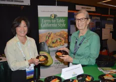 Kim Kurata and Ann Segerstrom with the California Avocado Commission, showing some avocado dishes for attendees to try.