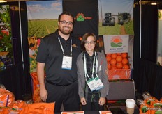 Chris Smotherman with his son Cameron Smotherman, showing carrots and representing Kern Ridge Growers.