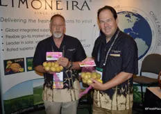 Rick Goodside and John Carter, showing Limoneira's pink lemons.