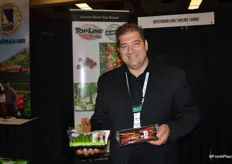 Dino Dilaudo with Westmoreland/TopLine Farms proudly shows a new product: hot peppers. The mini cocktail cucumbers are in their first season, so a relatively new product as well.