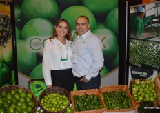 Limes, key limes, peppers and coconuts from Mexico on display in the Colimex Tropical Fruit booth, represented by Erika Anguiano and Antonio Gudino.