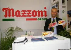 Frozen Fruits Director, Nicola Borgatti with their new product at the Mozzoni Group stand.