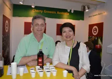 Simon Boughey - Cherry Growers AU and Agnes Bernard - Australia Fresh giving out samples of a new cherry juice Bite Riot.
