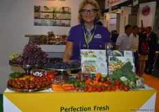 Helen Waterworth at Perfection Fresh with grapes, peppers, tomatoes to name but a few!