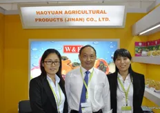 David Wang, the president of Jinan Haoyuan Agricultural Products Co., Ltd. from Jinan in Shandong provice, together with Clara Wang to his right and Zhao Junmei to his left.