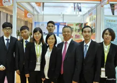 Nan Feng Green Tree Import & Export Trading Co., Ltd. is present with a large team. The company produces and exports citrus. They have also recently started with the import of dragon-fruit. On the photo are Charleston Xiong, the general manager (third from left), West Hu, the import manager and Albert Wu, the export manager. In the middle of the picture is Miss Mary Chen, the president.