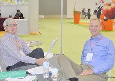 Anton Kruger of the South African Fresh Produce Exporter's Forum is having a laugh with Richard Owen of PMA.