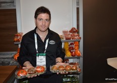 Jimmy Coppola with Westmoreland Sales/TopLine Farms proudly showing new tomato products and new packaging: Heirlooms and Browns.