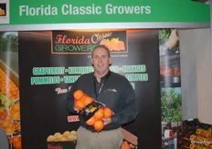 Al Finch with Florida Classic Growers, showing navel oranges.