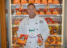 Chef Scott Seddon with Pero Family Farms shows a bag of mini sweet pepper rings as well as a snack pack with a yogurt ranch dip.