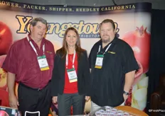 Jeff Olson, Michele Morgan and Brian Forrest with Youngstown Distributors, known for pomegranates and arils.