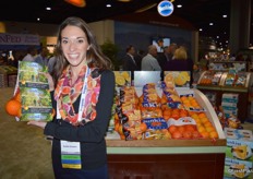 Joan Wickham with Sunkist showing peak of season heritage packaging for sweet navel oranges. This label will only be used when production is at its peak.