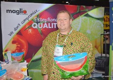 Richard Butera with Maglio Companies, showing the pouch bag with seedless watermelon.