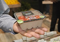 The new packaging for organic grape tomatoes from Red Sun Farms, it is a fiber base packaging.