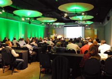 Lots of people interested in the presentation area of the event.