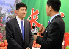 Wen Zhigang, the Chief of the Communist Party Committee of Changwu County, is being interviewed by a team of the Chinese National Television CCTV