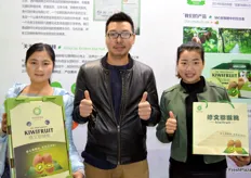 Zhang Shiyu, Orlando Loo and Yan Shiyu are showing the new kiwifruit packaging lines of Ding Yu Guo, a kiwi producer from Quizhou Province