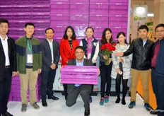 The enthusiastic team of ALSCO with the company's purple crates in the background. In the front sits Tony Sun, the General Manager. In the back from left to right are Guan Yi, Ning Xin Cong, Xu Jian Hua, Pang Cun Yu, Li Mei Hua, Mina, Yang Xue, Zhuo Guang and Song Ji Hua. The company is investing in cold chain logistic technology for the Chinese fresh produce and flower market