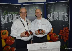 Jim DiMenna and Jim D'Amato with Red Sun Farms showing grape tomatoes on the vine from the Artisan series as well as organic grape tomatoes in a new recyclable package.