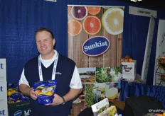 Brad Blaine with Sunkist showing a pouch bag of Meyer Lemons.