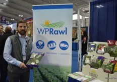 Ashley Rawl with WP Rawl showing seasonal harvest kale.