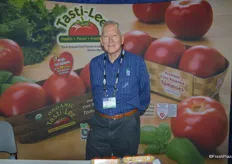 Michael Ryshouwer with Bejo Seeds in front of the Tasti-Lee tomato display.