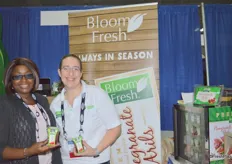 Claire Sakho with Global Bloom and Stefanie Katzman of Katzman Produce showing pomegranate arils.