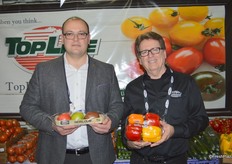 Max Mastronardi and Matt Wright of Westmoreland- TopLine Farms showing heirloom tomatoes and colored bell peppers.
