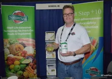 Brendan Foley with NatureSeal showing the company's new product that maintains the natural color of fresh- cut avocado and guacamole without altering the flavor.