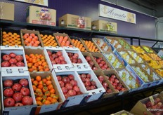 Pomegranates and persimmons on display at E. Armata.