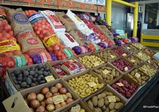 Selection of potatoes and onions.