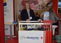 Debbie Etsell, Executive Director of BC Blueberries, displaying the various ways that blueberries can be produced, such as juice, dried, frozen and freeze dried.