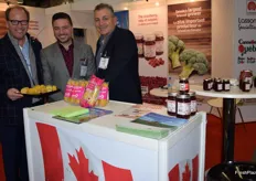Pierre Laurence, Vito Monopoli and Lee Masoud from Lassonde, feature one of their newest products at Fruit Logistica, pre-cooked corn on the cob.