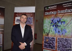 Michal Krzanowski, Sales Manager for Korfanty Nursery, presenting their Haskap berry plants to Fruit Logistica visitors in the Polish Pavilion.
