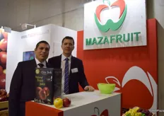 Mohamed Marawan- Managing Director and Michal Stokowski- Chairman of the Board from Mazafruit, displaying their fresh apples and apple juice.