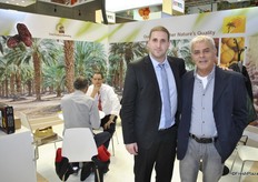 Tal Dagul and Tal Ochana from Field Produce Marketing on their left is Avi Dagul in a conversation with a customer.