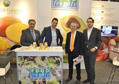 Sukhdev and Benjamin Singh on the left with two customers