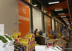 A varied display of produce including beans, kiwifruit, ginger and limes at the Pure Organic Harvest store.