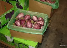 Small and stripey eggplant on display in the growers section stood out against the more familiar purple variety.