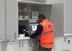 An office just off the main packing area makes it easy for staff to switch between tasks.