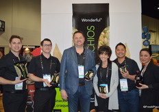 The team of the Wonderful Company, proudly showing Wonderful Pistachios and Pom juice.