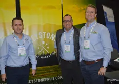 Matthew Gideon and Shawn Riker with Keystone Fruit Marketing. On the right, Cory Stahl with Progressive Produce.