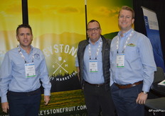 Matthew Gideon and Shawn Riker with Keystone Fruit Marketing. On the right, Cory Stahl with Progressive Produce.