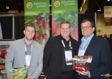 Ryan Cleary, David Roby and Mike Preacher with Domex Superfresh Growers, showing pouch bags with pears and cherries.